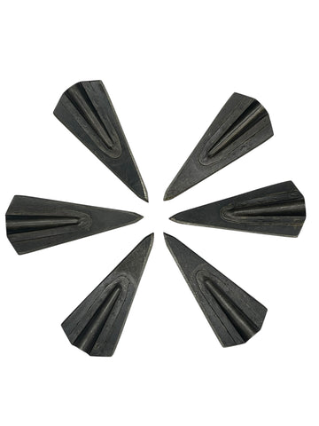 Six Tusker Concord broadheads in a circular pattern on a white background
